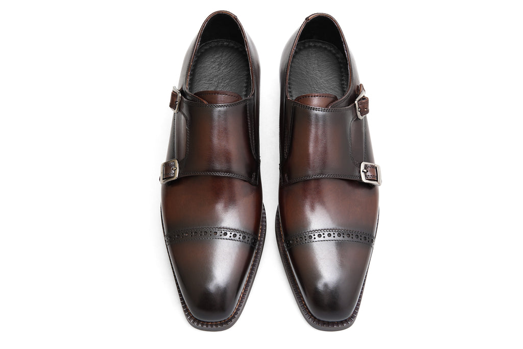 Crafted from Italian calf leather with fine stitching and a hand-polished finish