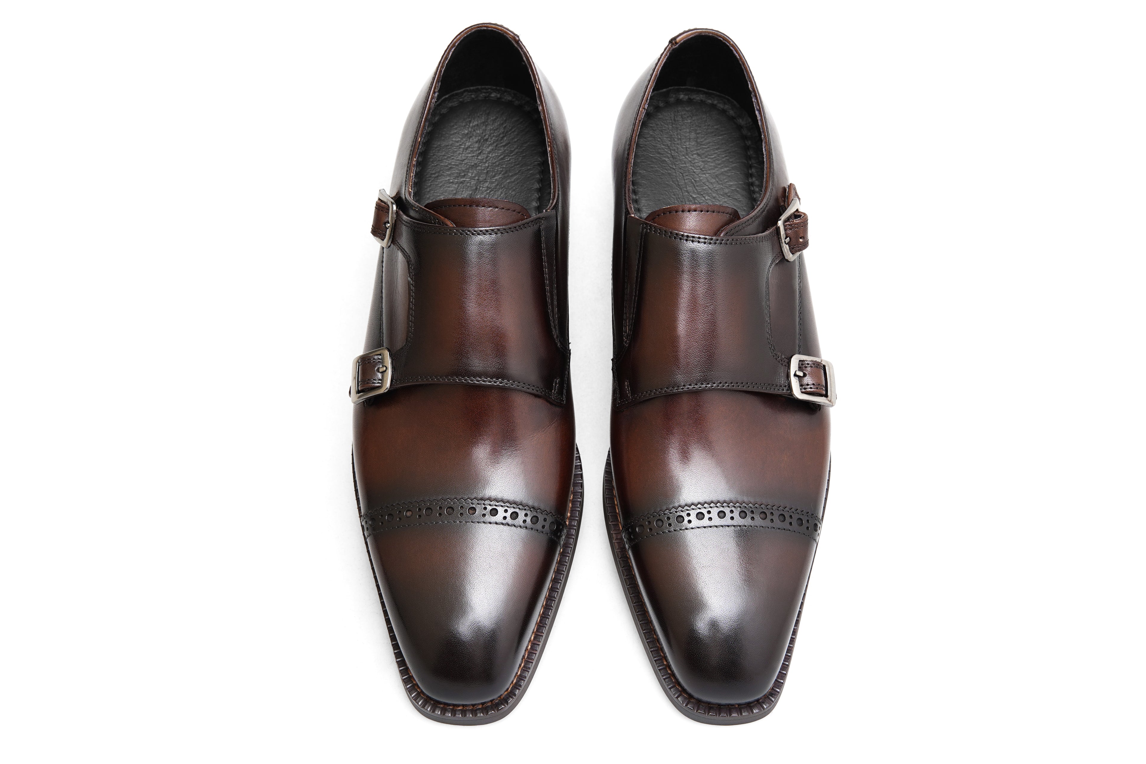 Crafted from Italian calf leather with fine stitching and a hand-polished finish